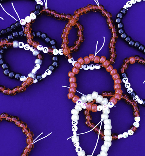 Rise-Up to HIV and ACT UP Bracelets. Photo by Alina Oswald.