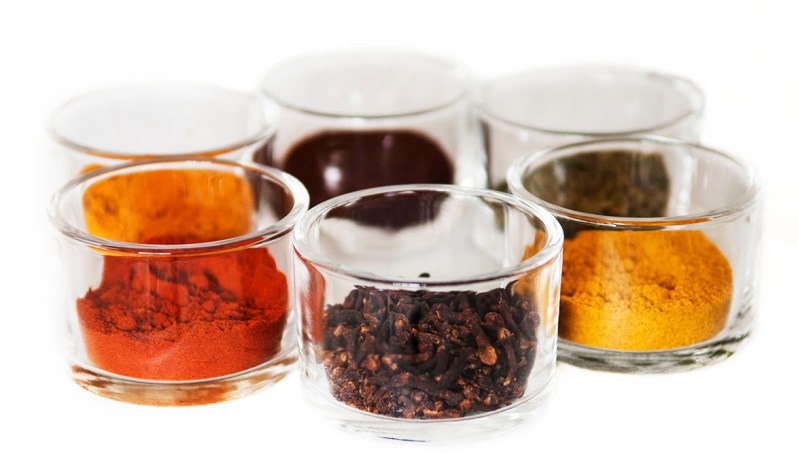 glasses full with essence and spices