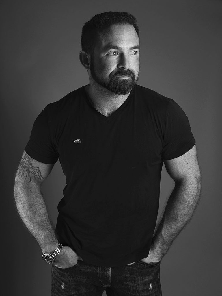 black-and-white studio portrait by Alina Oswald.