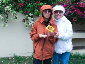 With Mom and flowers.