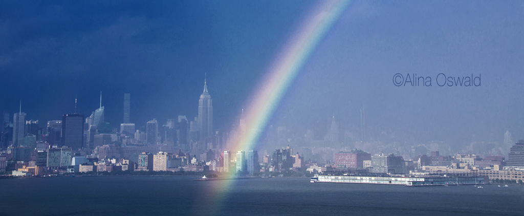 Rainbow over Manhattan skyline on a stormy day. Photo by Alina Oswald.