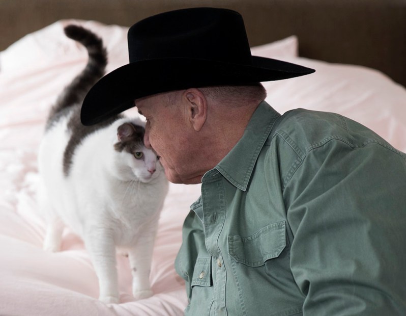 Advocate David Mixner and one of his cats. Photographed by Alina Oswald for A&U Magazine--America's AIDS Magazine.
