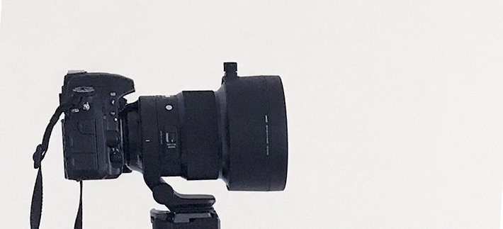 Sigma 105mm f/1.4 for Nikon on tripod. Photo by Alina Oswald.