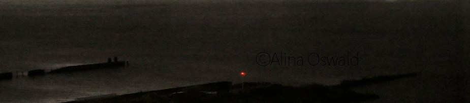 Pier at night. Photo by Alina Oswald.