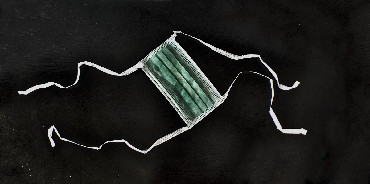 Green Surgical Mask. Photo by Alina Oswald.