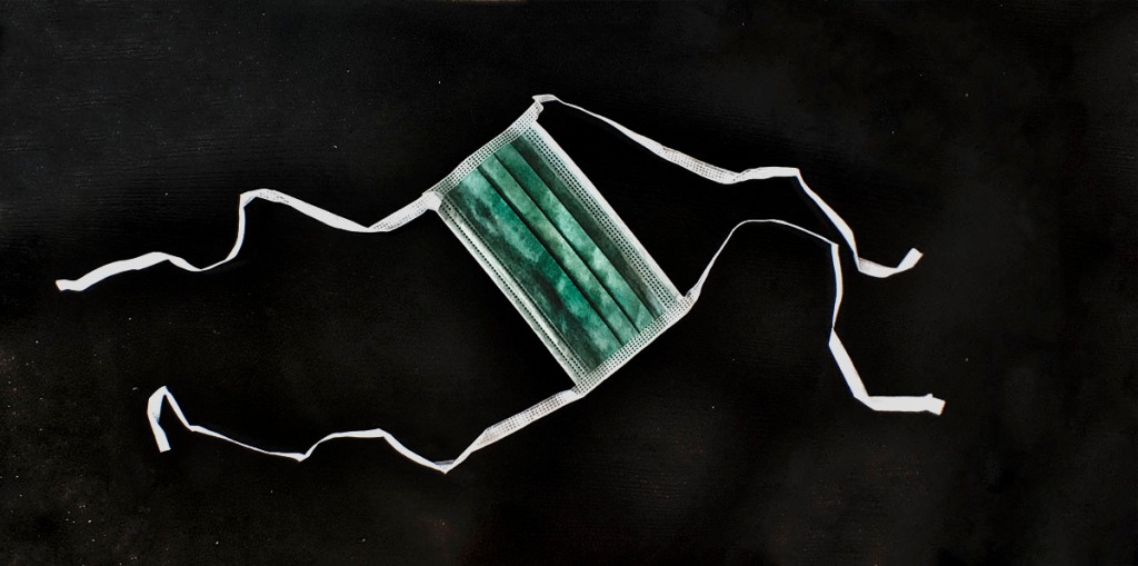 Green Surgical Mask. Photo by Alina Oswald.