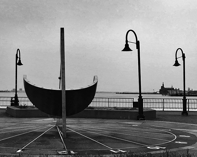 Sundial on deserted Jersey City waterfront during Coronavirus pandemic. Photo ©Alina Oswald. All Rights Reserved.