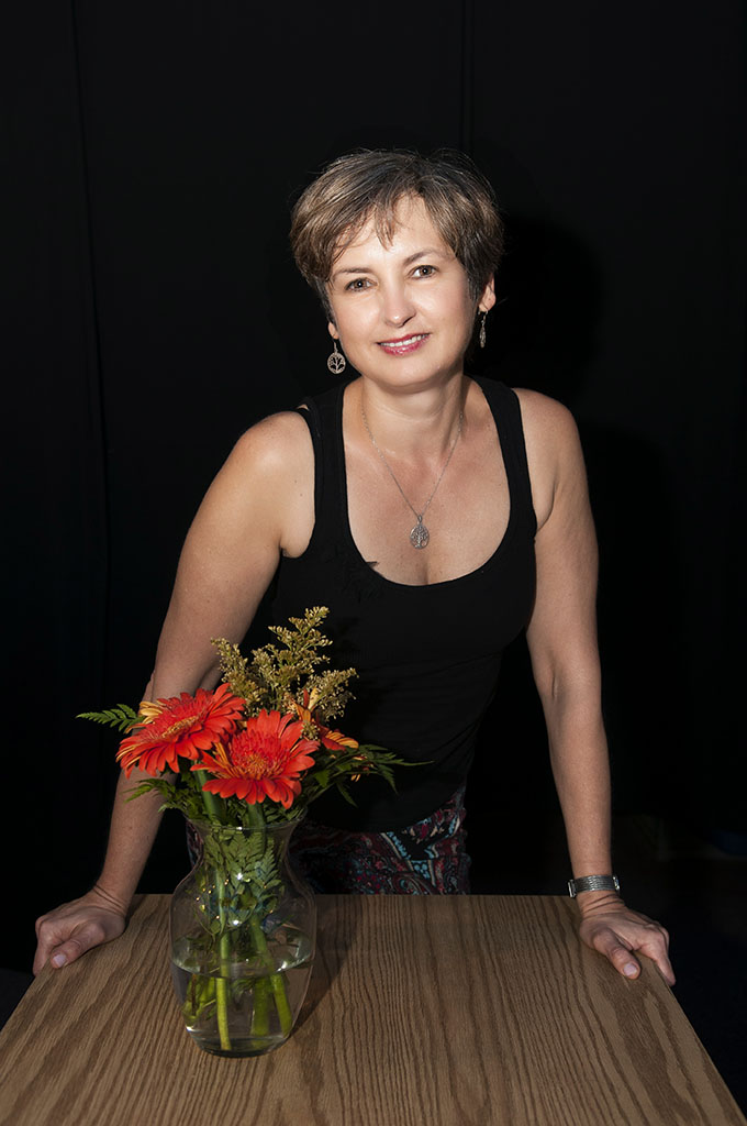 Carmen Rusu, Manager at Symposia Bookstore, Hoboken, NJ. ©Alina Oswald. All Rights Reserved.