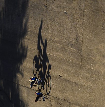 Shadows leaving Covid-19 darkness behind. ©Alina Oswald.