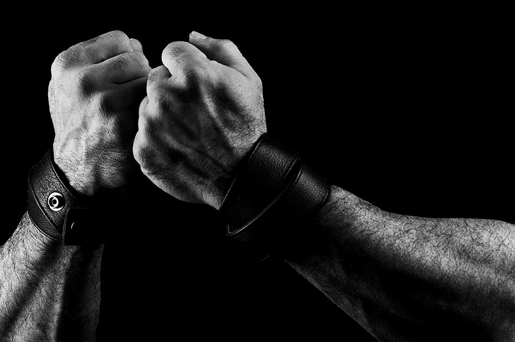 Act up. Fight Back. Hand portrait in black and white by Alina Oswald.