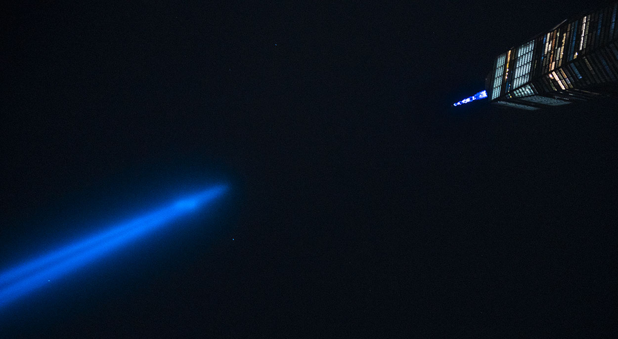 Blue Tribute Lights in NYC on the 20th anniversary of the September 11 attacks. Tribute in Light Memorial and the Freedom Tower. ©Alina Oswald. All Rights Reserved.