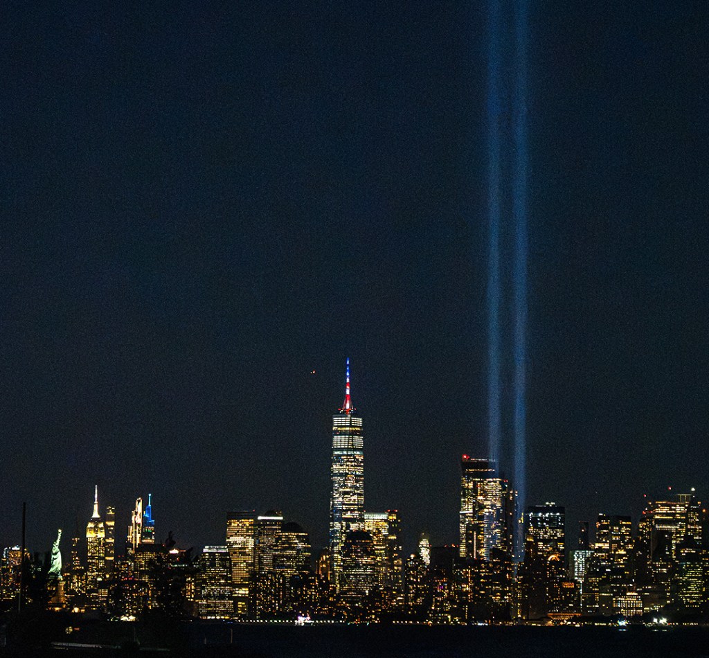 The 9/11 Tribute Lights on the eve of the 25th anniversary of the September 11 terrorist attacks. ©Alina Oswald. All Right Reserved.